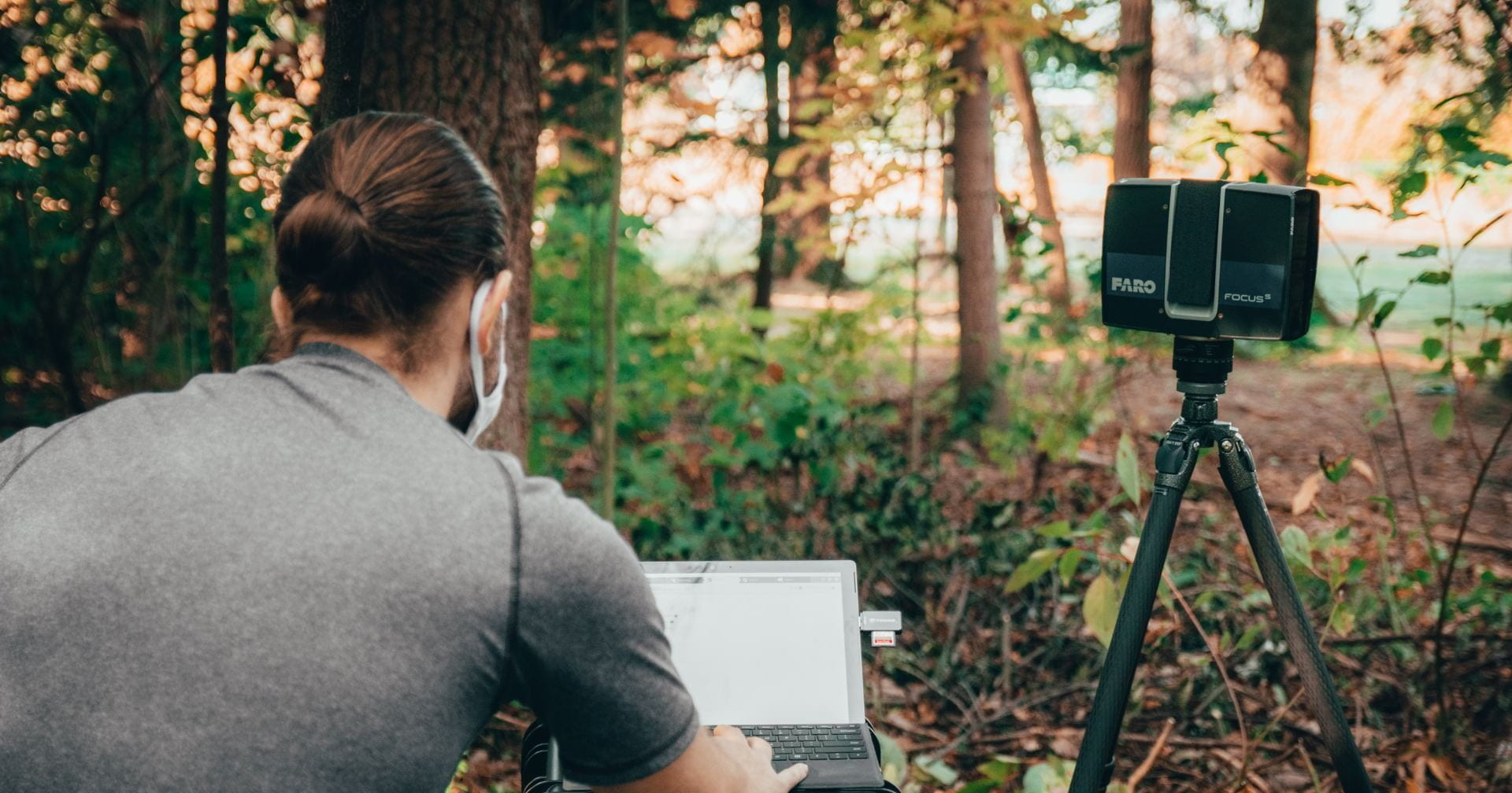 person using laptop lidar